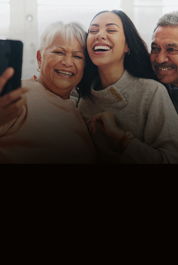 Smiling family taking a selfie together