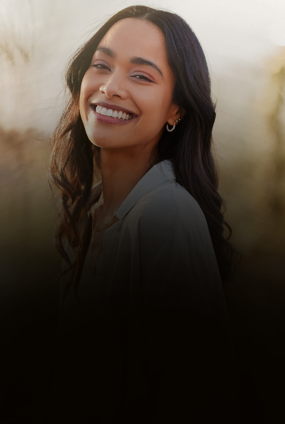 Smiling woman with long dark hair