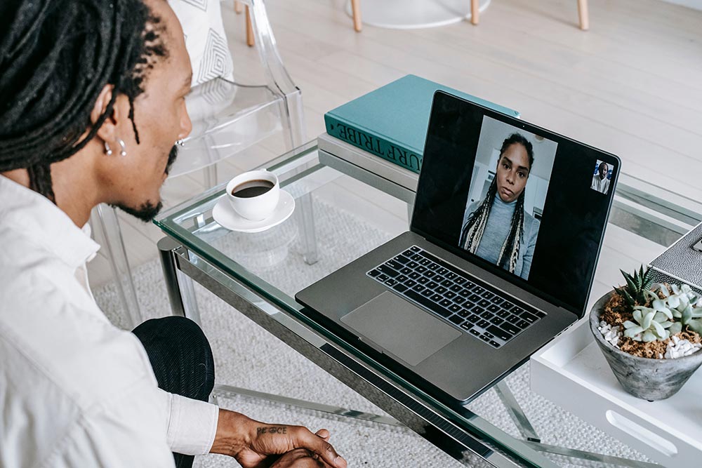 Therapist consulting with a patient via video call