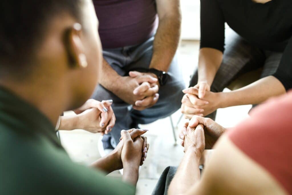 Diverse people in a religious group session